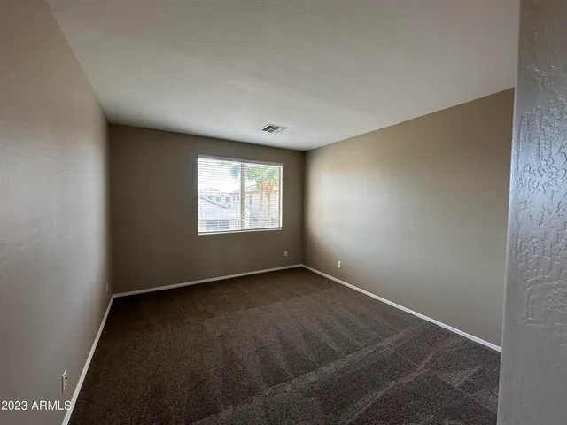 an empty room with closet