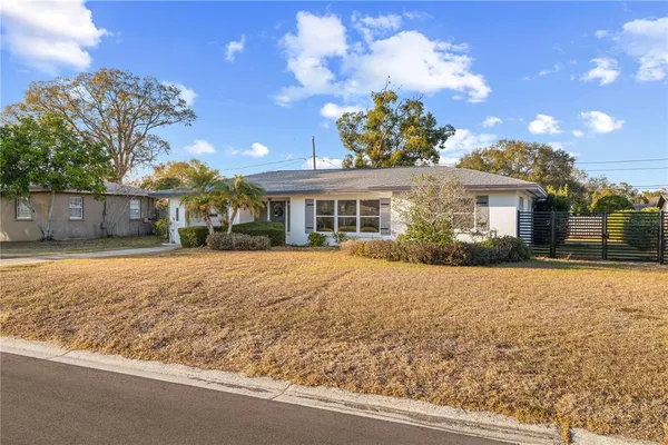 front view of a house with a yard