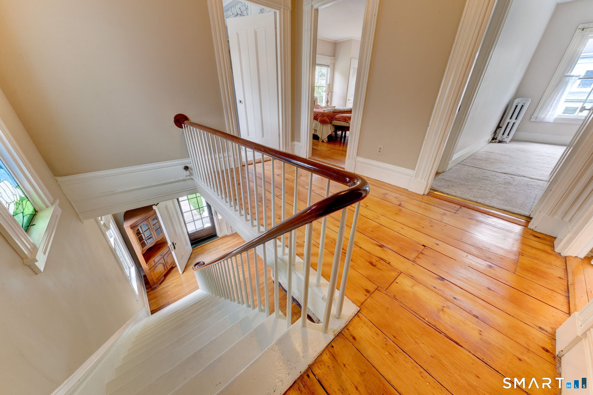 840 Worthington Ridge Berlin, CT 06037 - Photo 17 of 40 Traditional open stairway up to the second level (photo 2023)