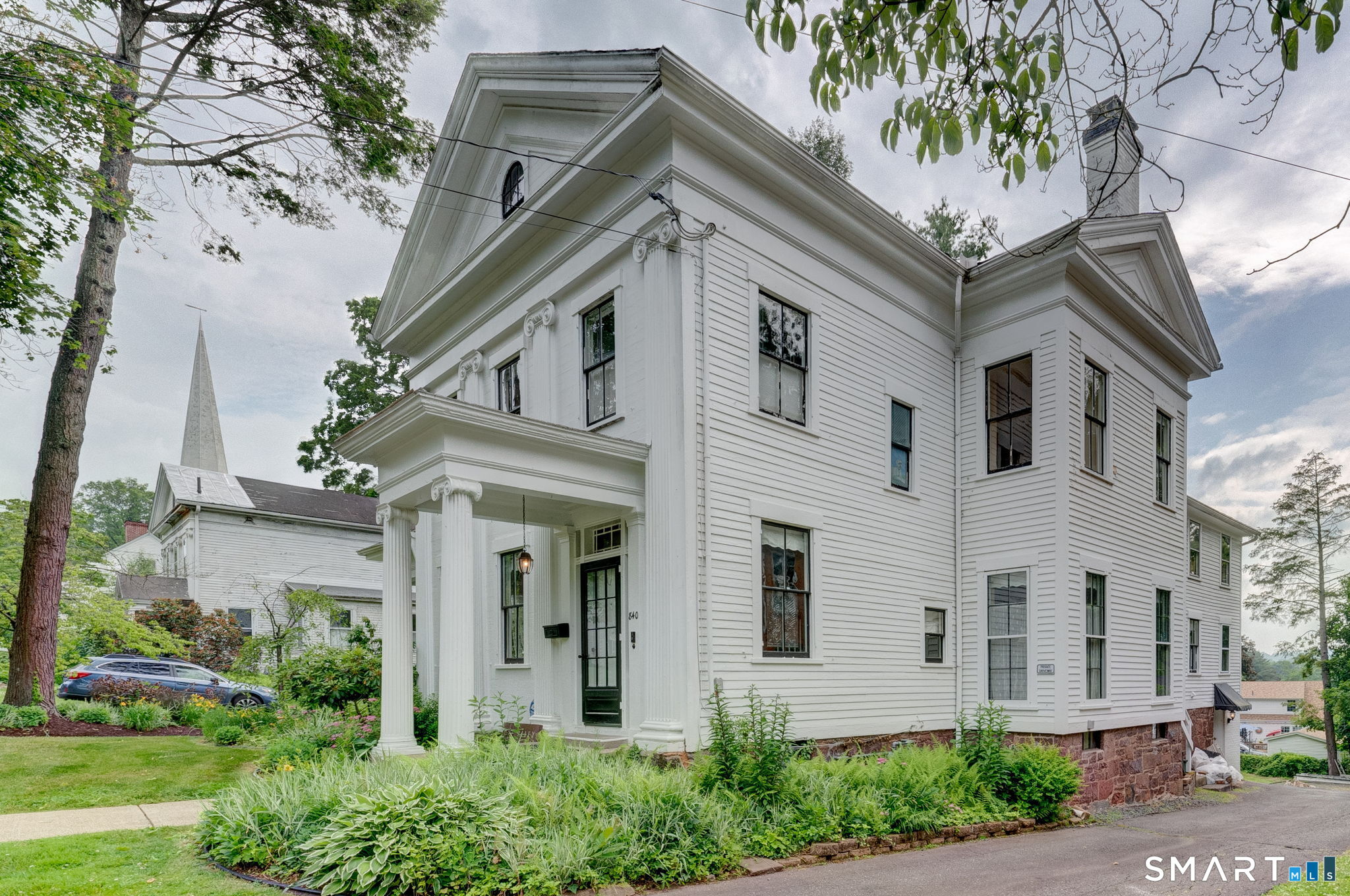 840 Worthington Ridge Berlin, CT 06037 - Photo 2 of 33 Fluted pilasters and Greek Rival tympanum (photo 2023)