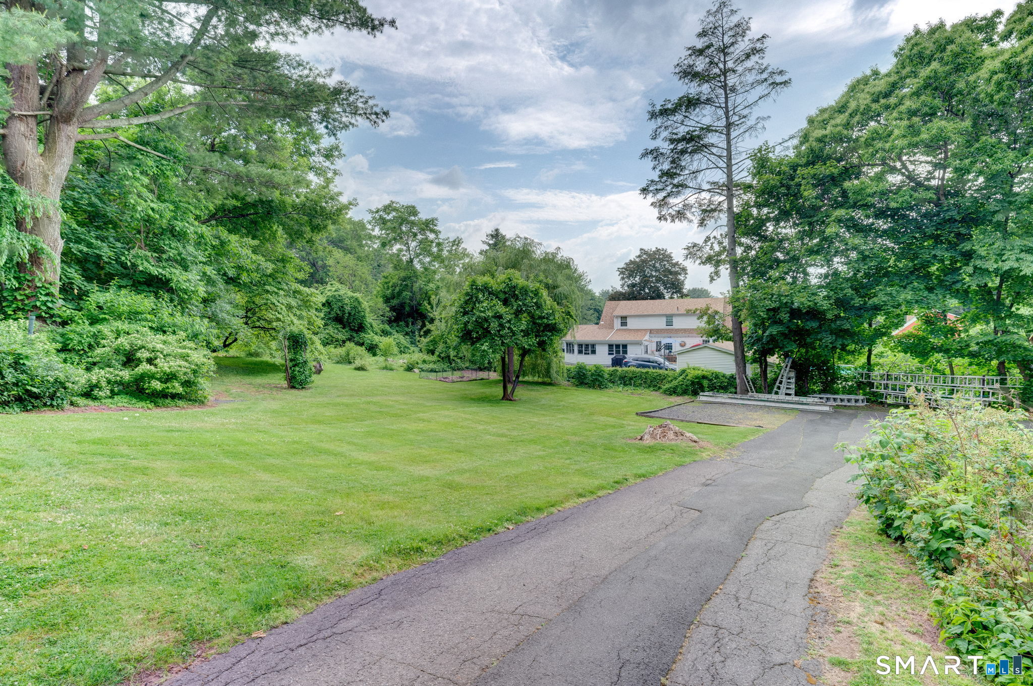 840 Worthington Ridge Berlin, CT 06037 - Photo 27 of 33 Mature trees border the fabulous backyard (photos 2023)