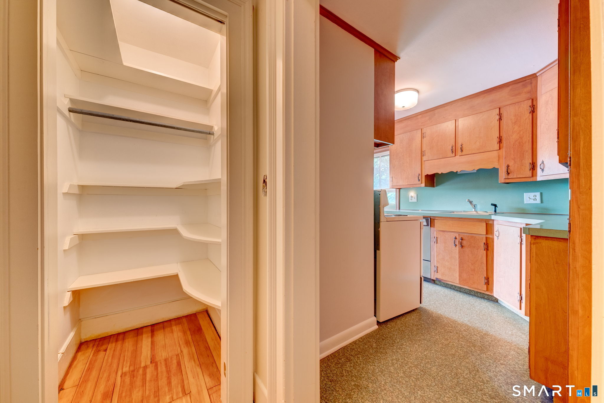 840 Worthington Ridge Berlin, CT 06037 - Photo 29 of 40 Walking closet to serve studio bedroom adjoins kitchenette (photo 2023)