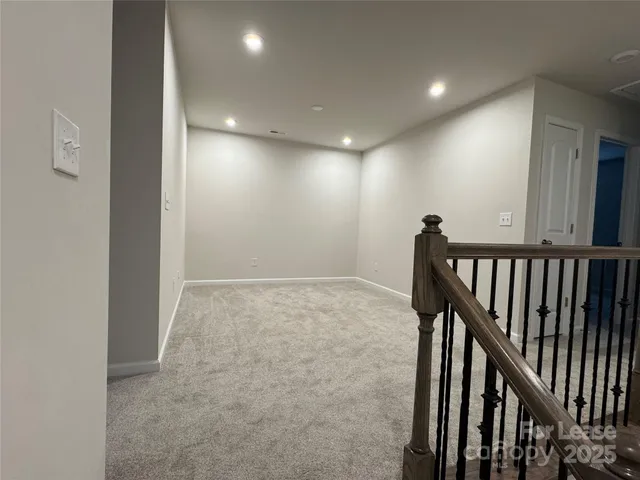 a view of hallway with stairs