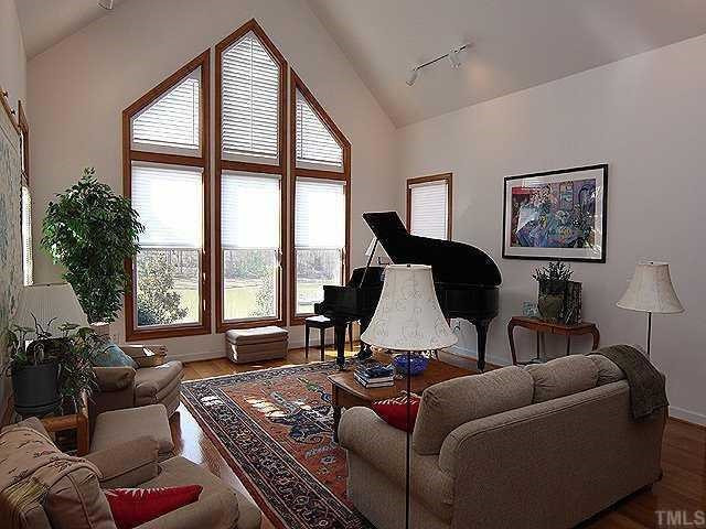 8330 Johnson Mill Road Bahama, NC 27503 - Photo 5 of 12 LIving Room, high ceiling, hardwood floor Living Room