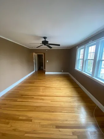 a view of an empty room with a window