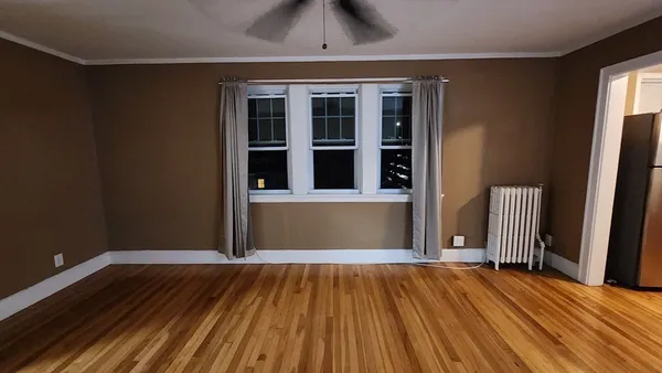 a view of a backyard of a house