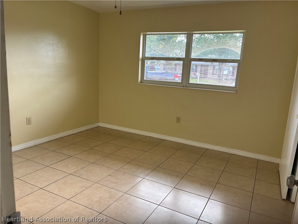 1525 Lagrange Avenue Sebring, FL 33870 - Photo 7 of 16 a view of a room with a window