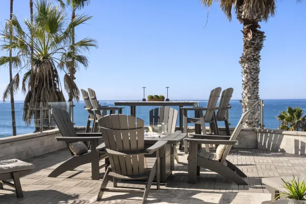 a view of a chairs and table in the patio