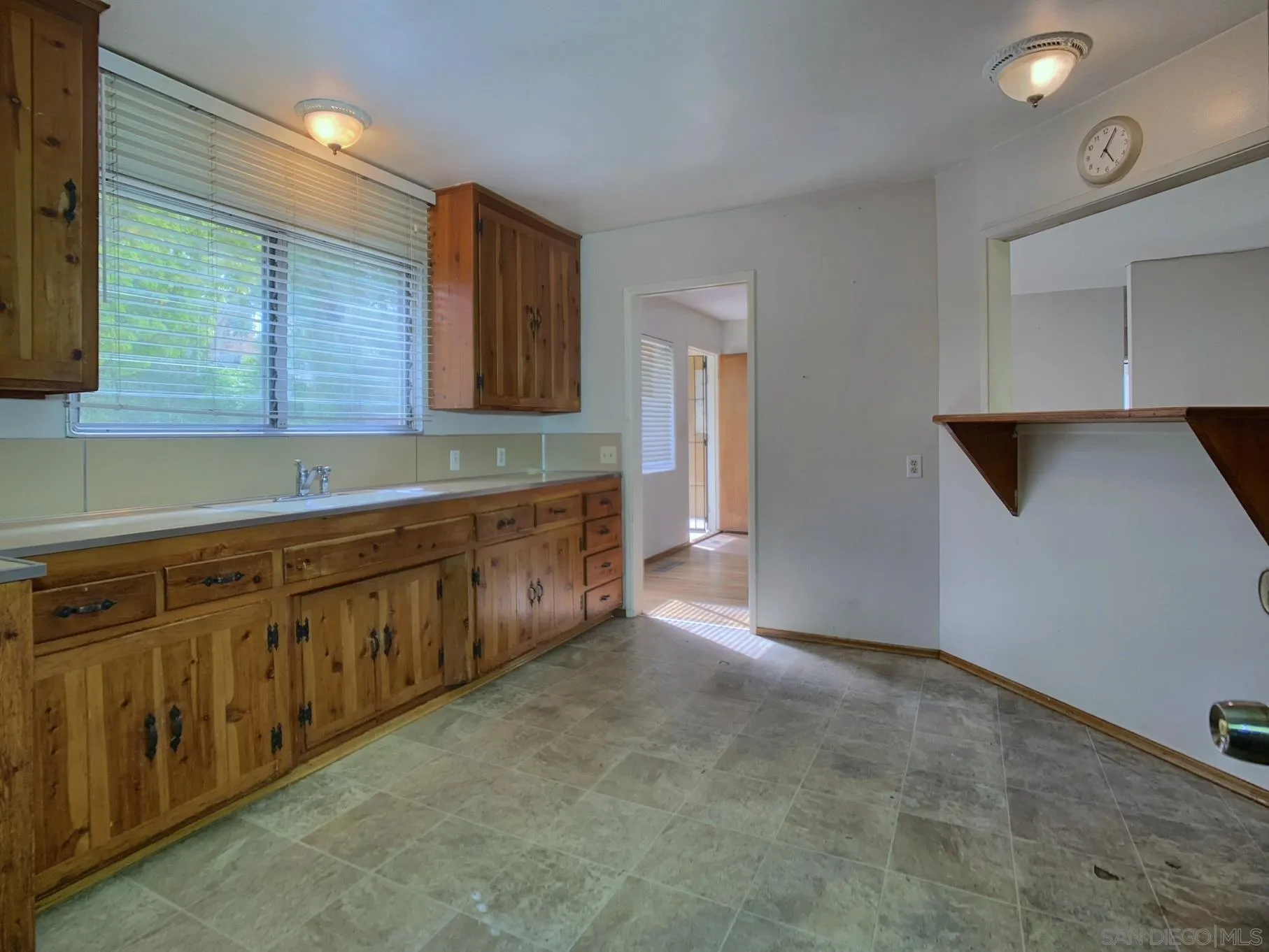 4240 Camino Paz La Mesa, CA 91941 - Photo 11 of 33 a view of a kitchen with cabinets