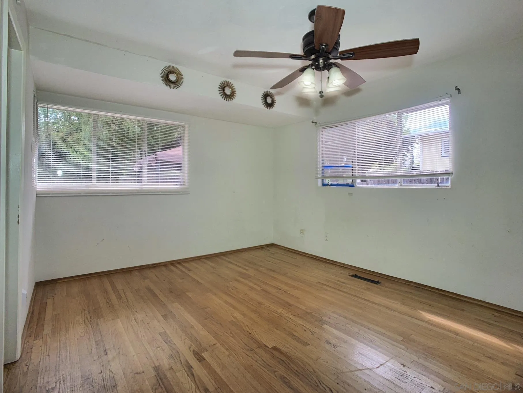 4240 Camino Paz La Mesa, CA 91941 - Photo 18 of 33 a view of room with window and wooden floor