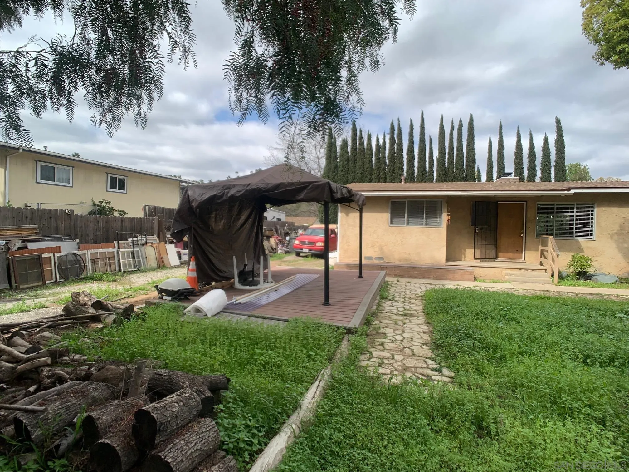 4240 Camino Paz La Mesa, CA 91941 - Photo 24 of 33 a front view of a house with garden