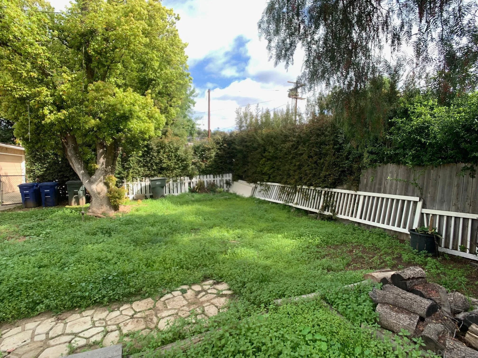 4240 Camino Paz La Mesa, CA 91941 - Photo 26 of 33 a view of a bench in a garden