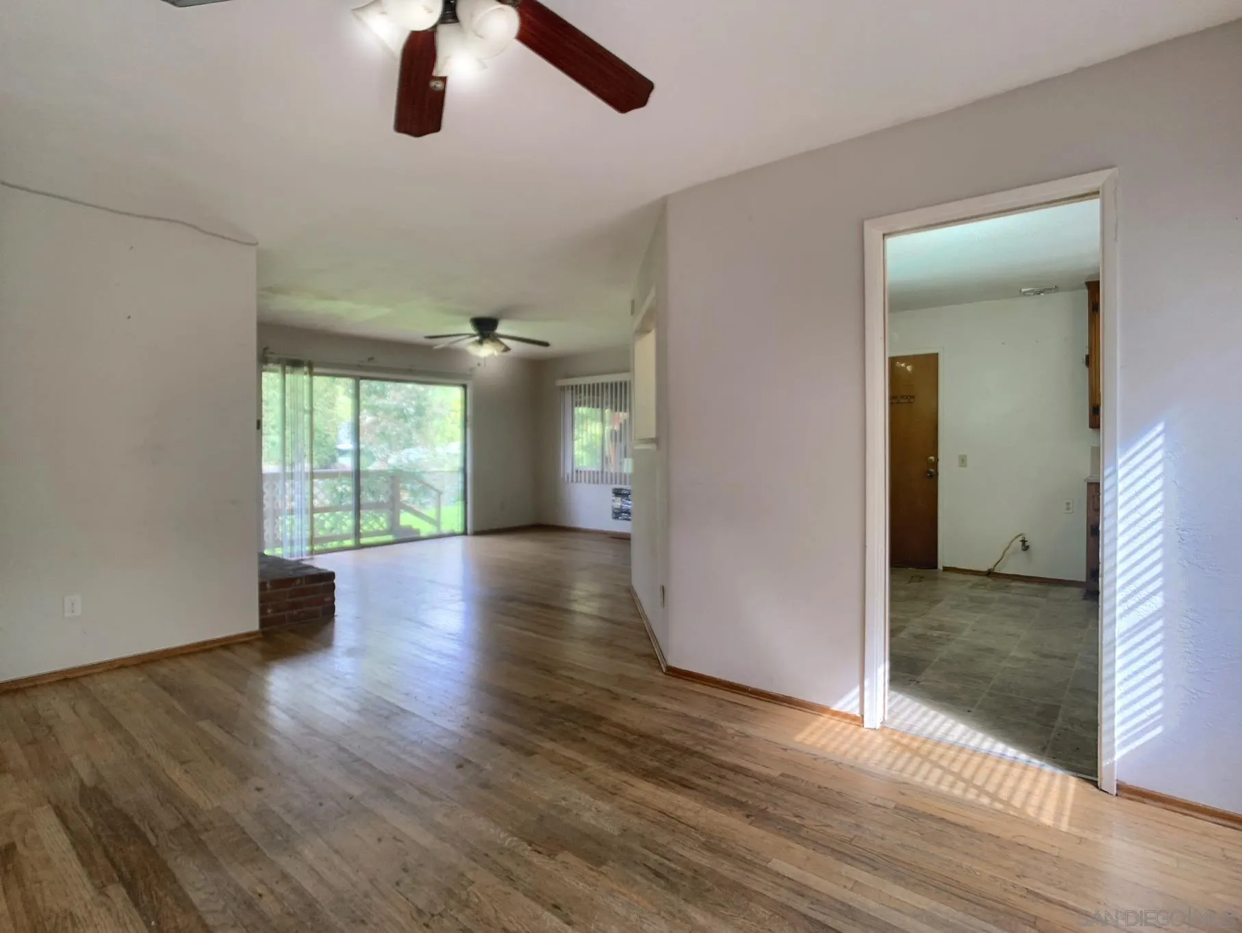 4240 Camino Paz La Mesa, CA 91941 - Photo 6 of 33 wooden floor in an empty room with a window