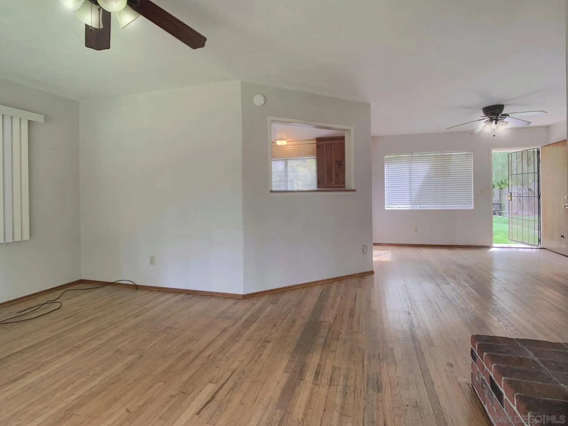 4240 Camino Paz La Mesa, CA 91941 - Photo 8 of 33 wooden floor in an empty room with a window