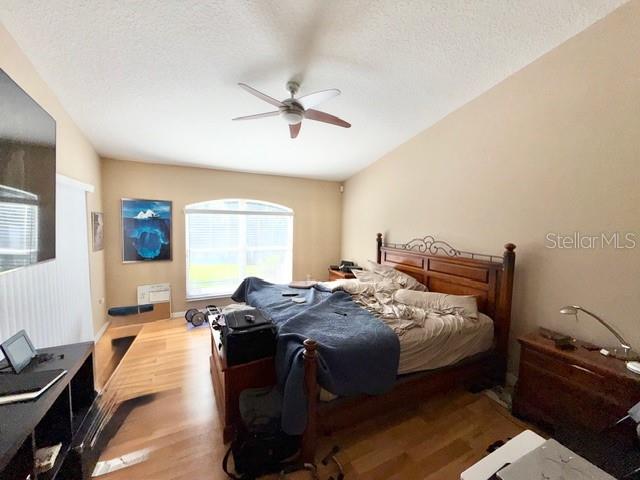 319 Green Reed Road DeBary, FL 32713 - Photo 14 of 21 a bedroom with bed and window