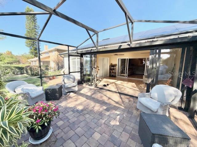 319 Green Reed Road DeBary, FL 32713 - Photo 17 of 21 a outdoor living space with furniture and a potted plant