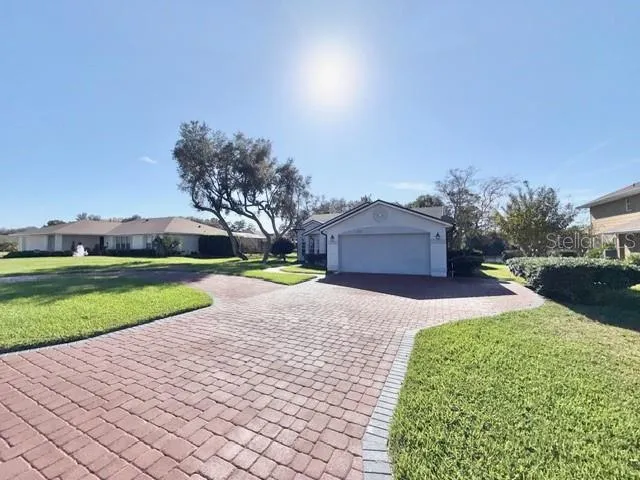 a house with yard in front of it