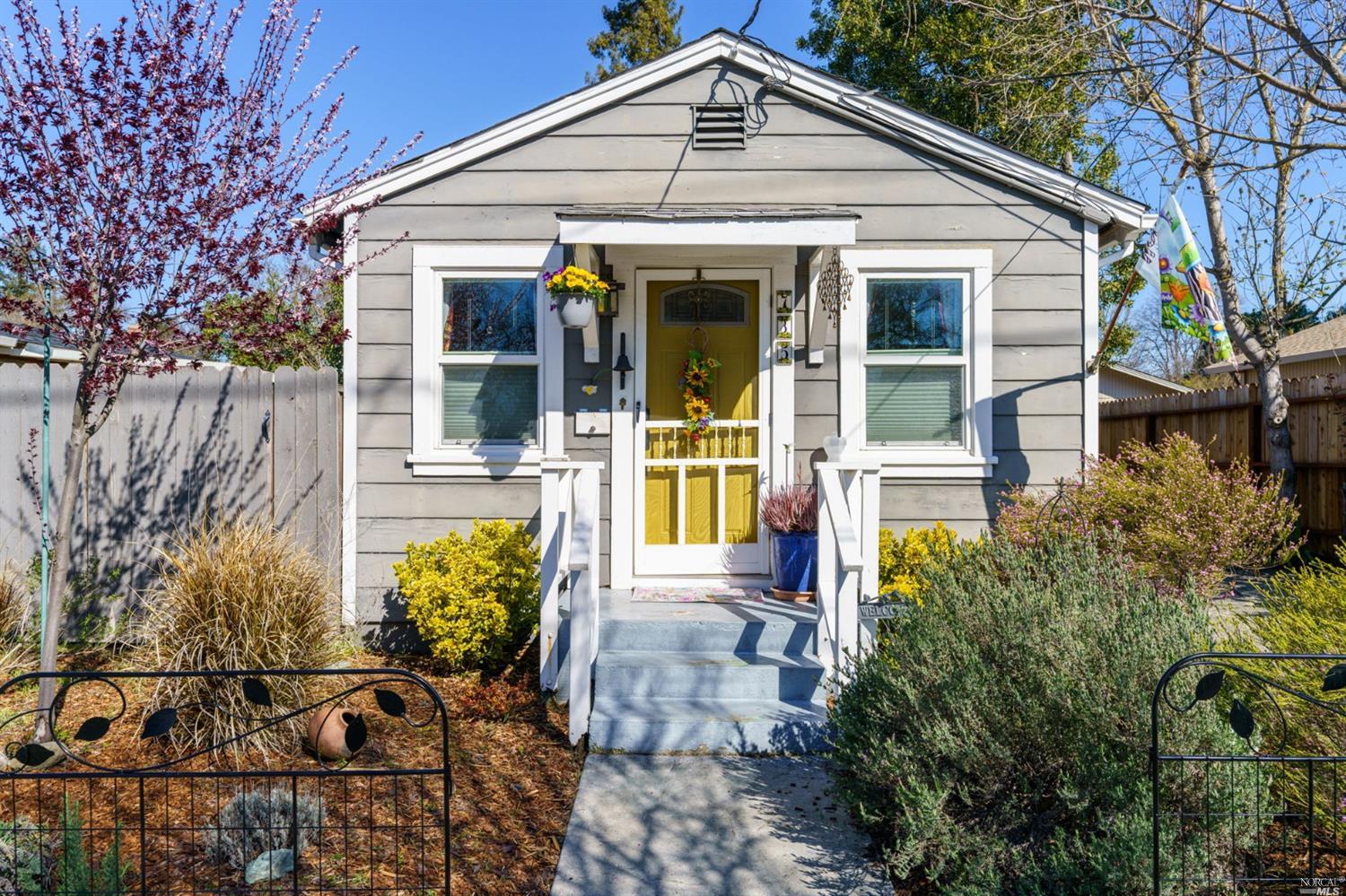 735 Pine Street Santa Rosa, CA 95404 - Photo 1 of 1 a front view of a house with garden