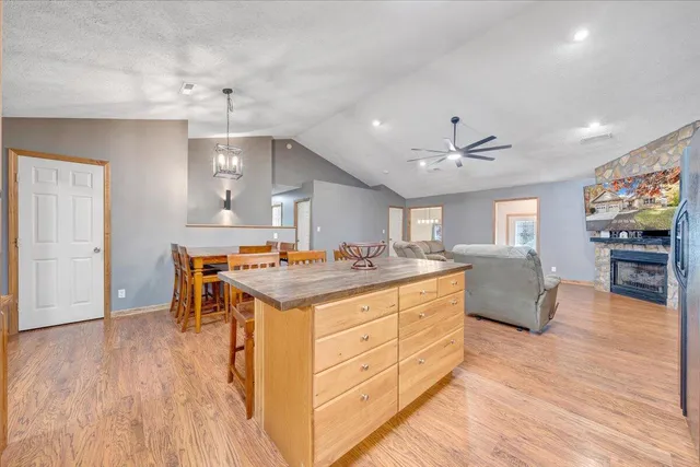 a spacious bathroom with a double vanity sink toilet and a mirror