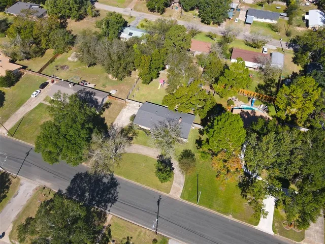 front view of a house with a garden