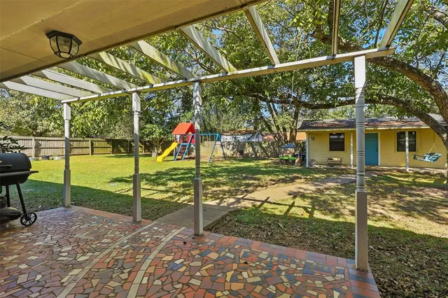 a view of a park with swings