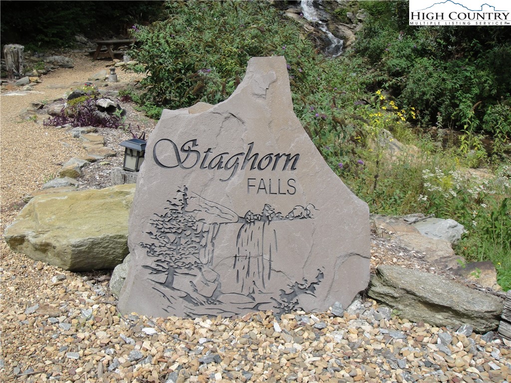 Lot 27 Wolf Pen Road Purlear, NC 28665 - Photo 24 of 48 a view of a wooden fence with large trees