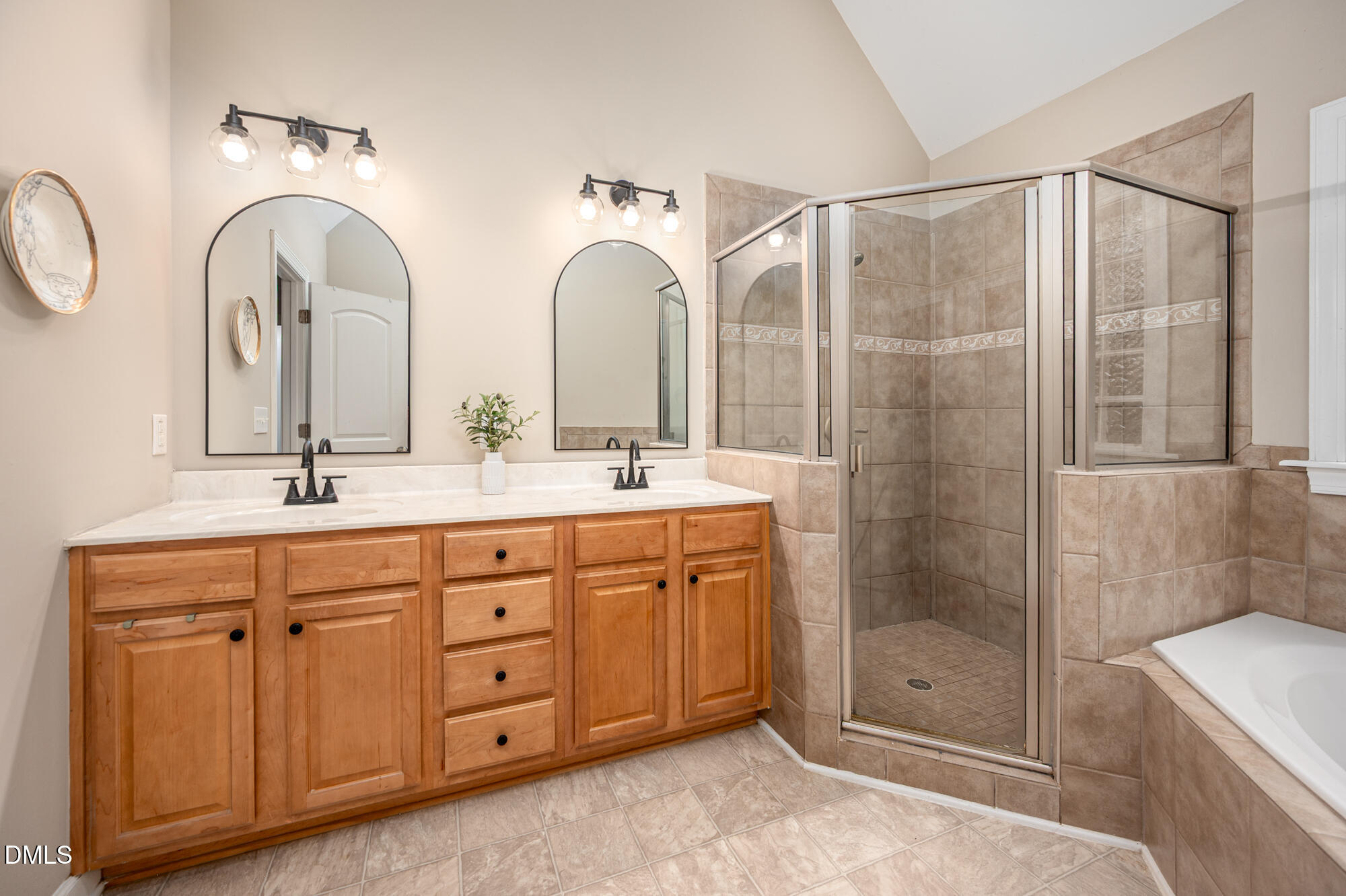 726 Ruth Circle Fuquay-Varina, NC 27526 - Photo 27 of 61 a bathroom with double vanity sink and a shower
