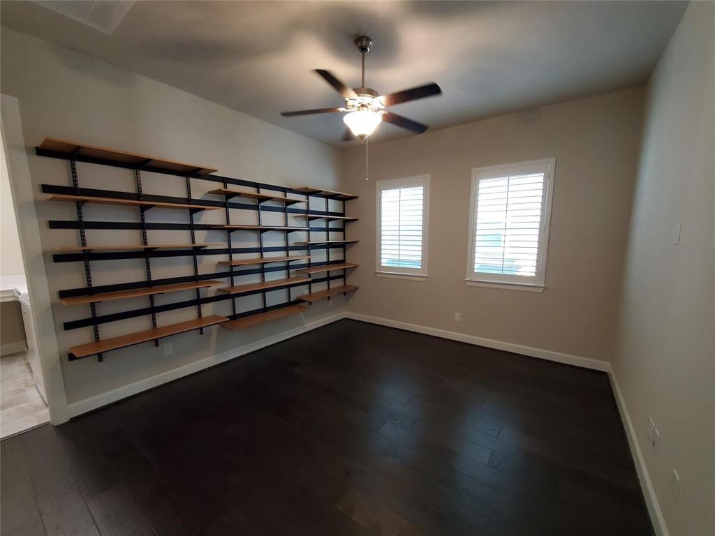 2846 Lotus Street Carrollton, TX 75007 - Photo 17 of 21 a view of entryway and hall with wooden floor