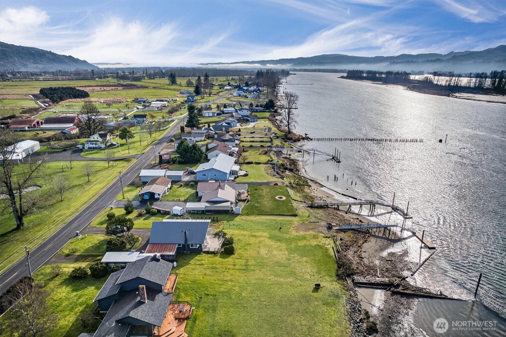 301 West Sunny Sands Road Cathlamet, WA 98612 - Photo 37 of 39 a view of a city with lawn chairs