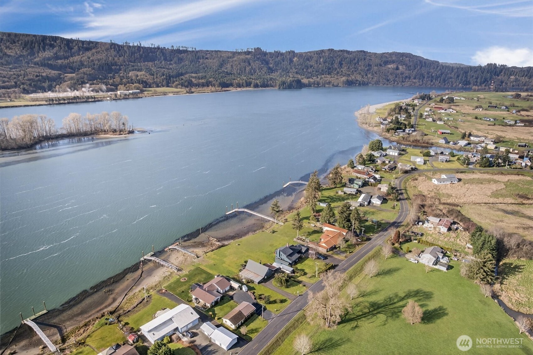 301 West Sunny Sands Road Cathlamet, WA 98612 - Photo 5 of 39 an aerial view of a residential houses and lake view