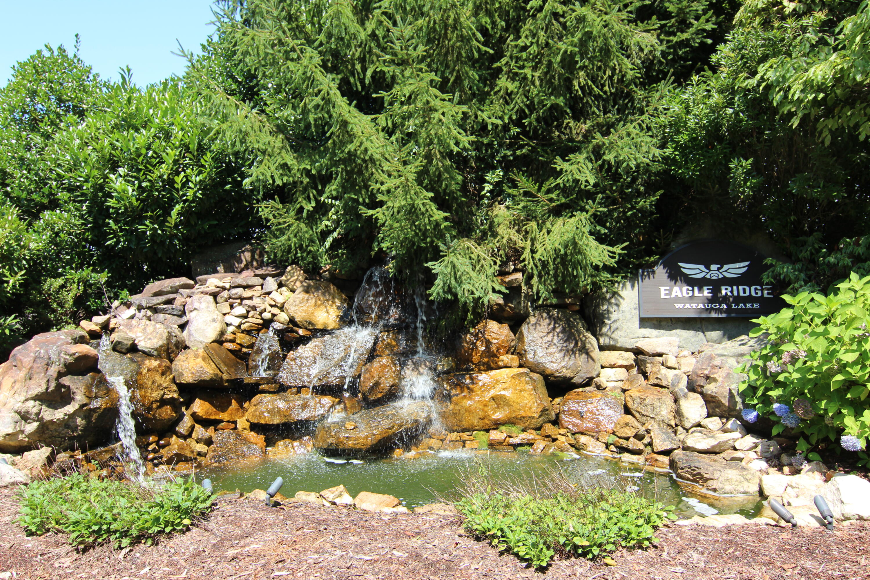 Lot #49 Redbud Circle, Unit 49 Butler, TN 37640 - Photo 4 of 84 EAGLE RIDGE WATERFALL AT ENTRANCE