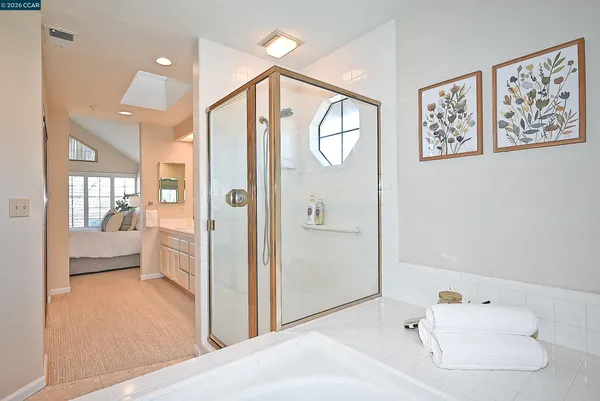 a bath tub sitting next to a window