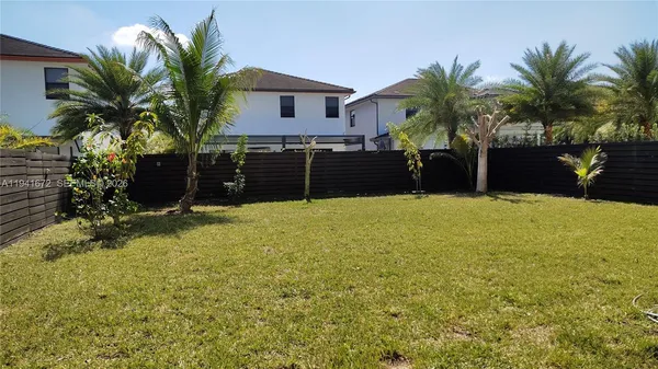 a house view with a garden space