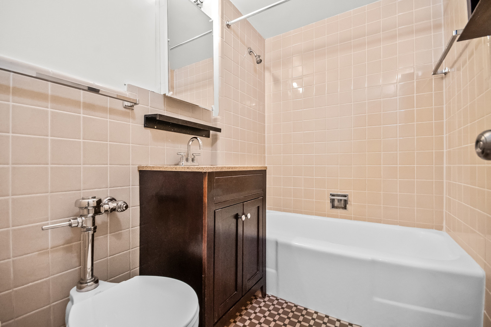 2230 Central Street, Unit G Evanston, IL 60201 - Photo 8 of 11 a bathroom with a sink toilet and shower