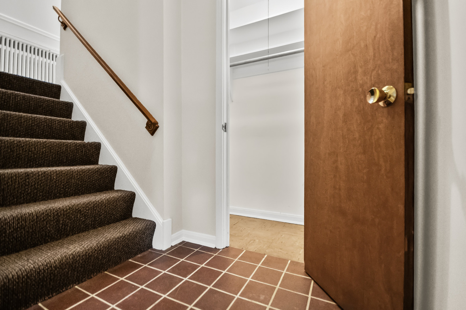 2230 Central Street, Unit G Evanston, IL 60201 - Photo 9 of 11 a view of entryway with stairs and a rug
