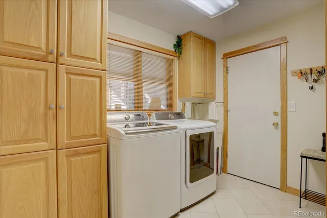 a view of a kitchen with washer and dryer