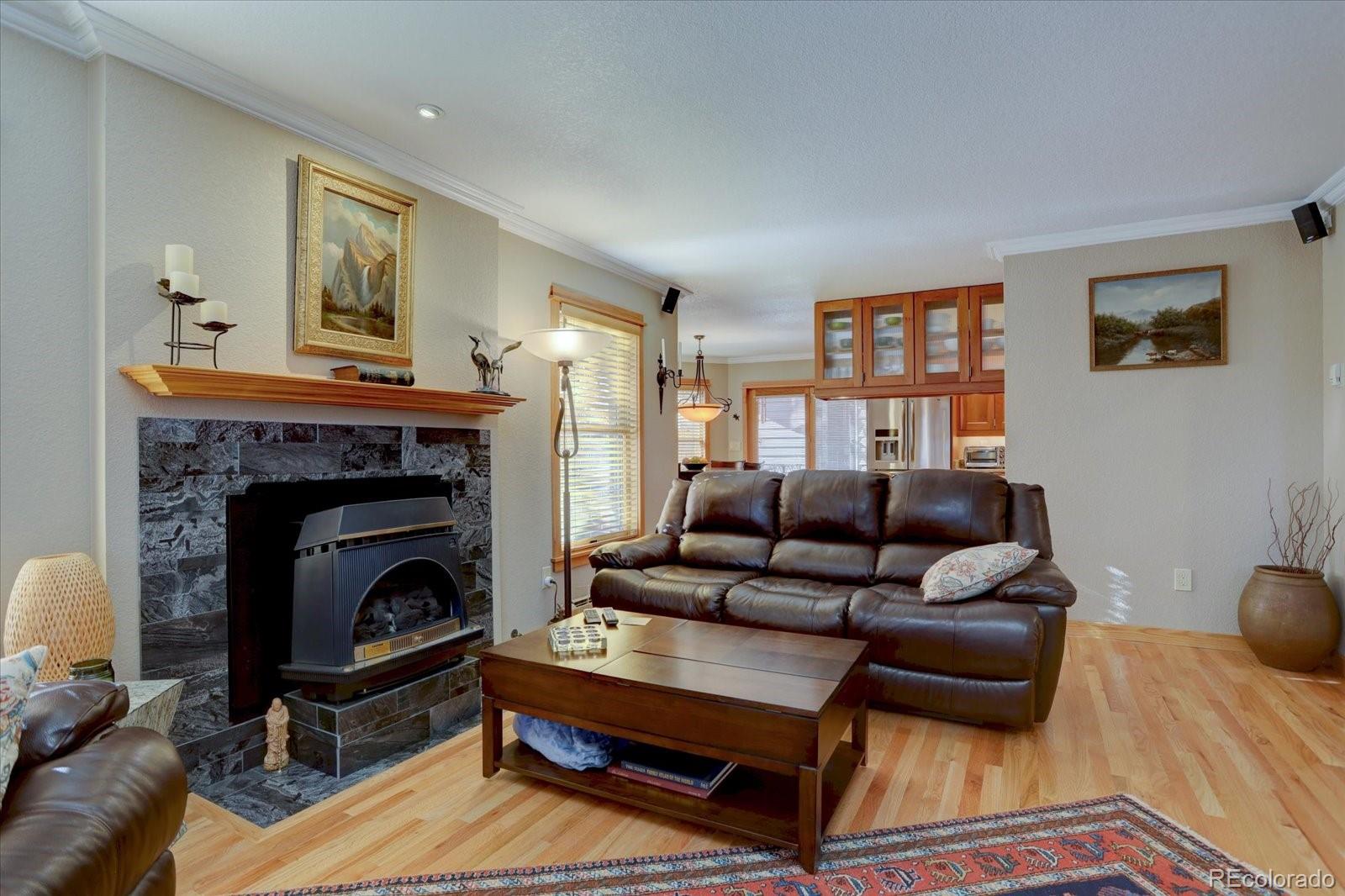 815 16th Street Boulder, CO 80302 - Photo 3 of 47 a living room with furniture and a fireplace