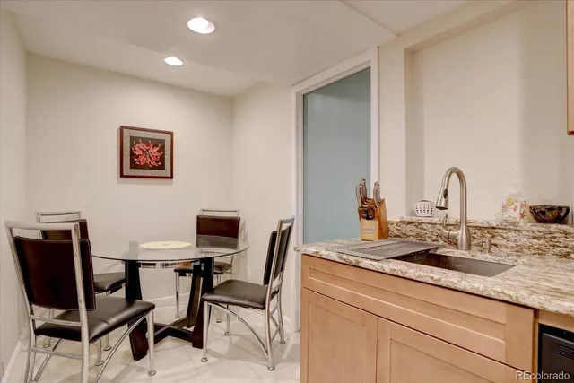 a view of a workspace with furniture