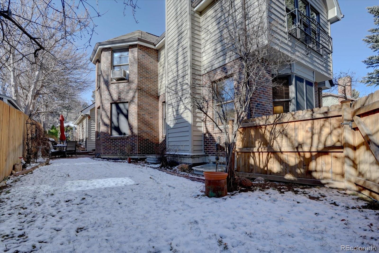 815 16th Street Boulder, CO 80302 - Photo 40 of 47 a view of a house with a snow in the yard