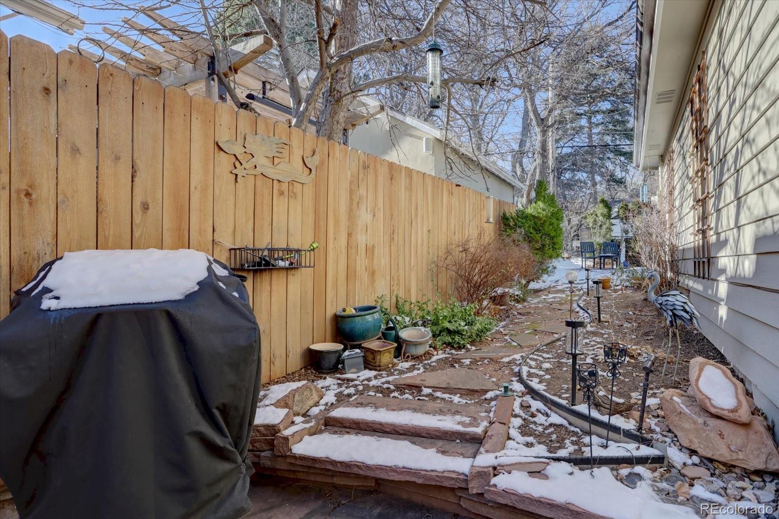 815 16th Street Boulder, CO 80302 - Photo 41 of 47 a view of a patio with furniture and plants