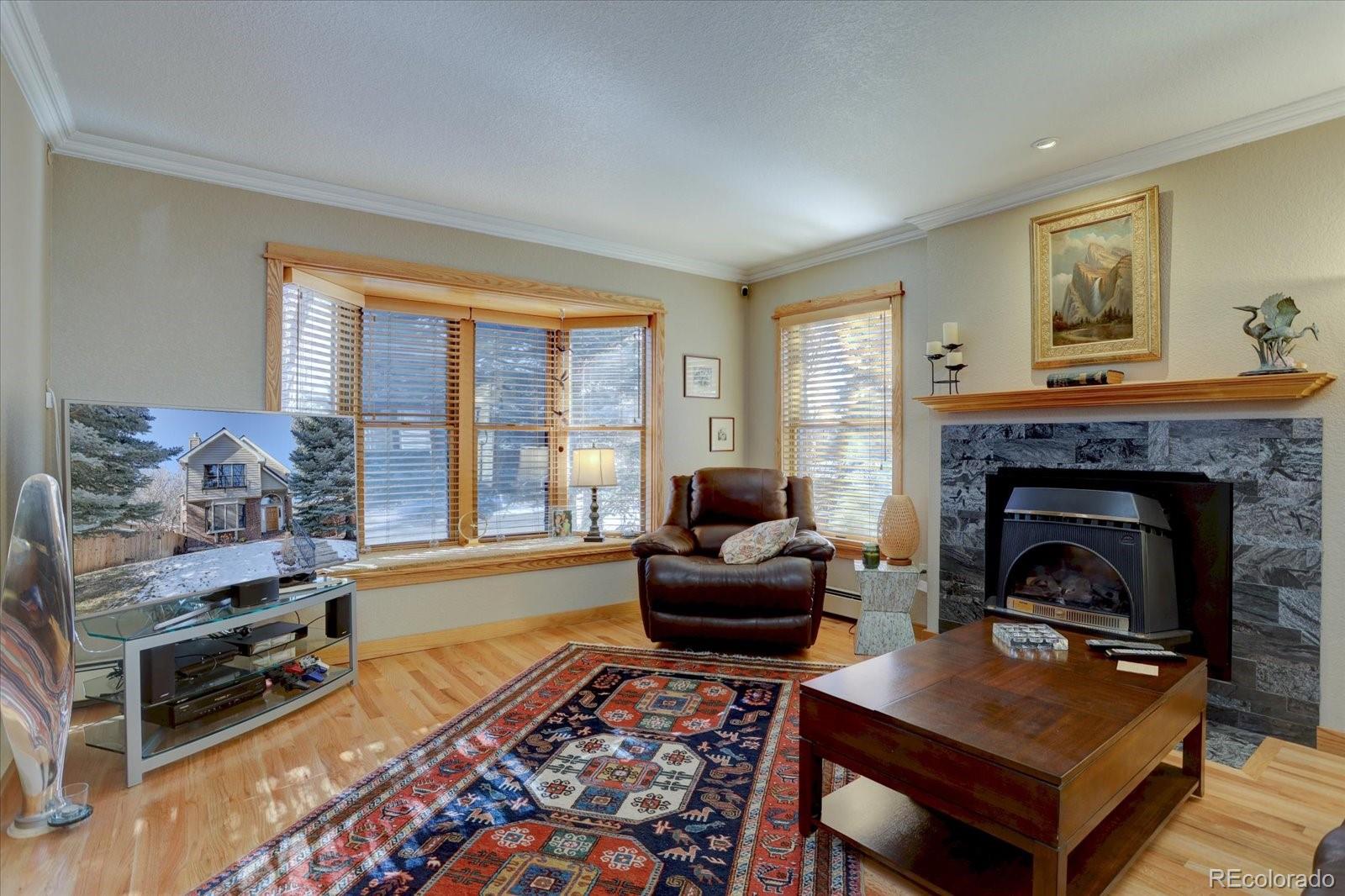 815 16th Street Boulder, CO 80302 - Photo 5 of 47 a living room with furniture and a fireplace