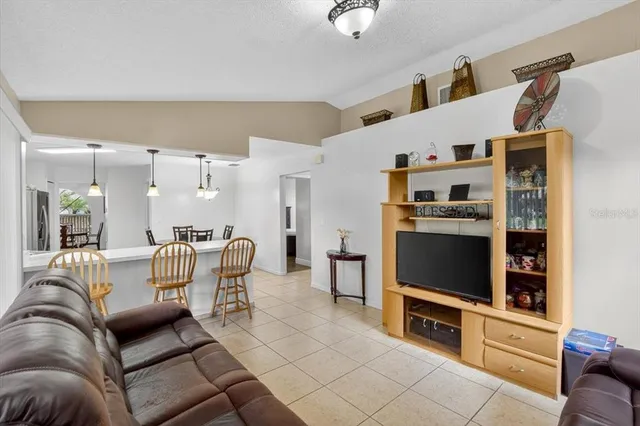 a view of a backyard with large trees