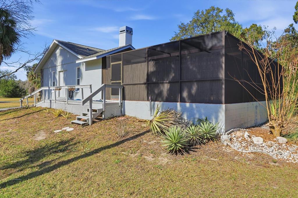 4601 South Gator Loop Homosassa, FL 34448 - Photo 35 of 49 a view of a house with wooden fence