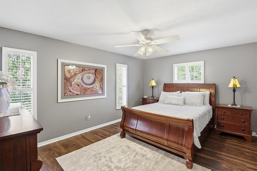 4601 South Gator Loop Homosassa, FL 34448 - Photo 5 of 49 a bedroom with a bed wall painting and window