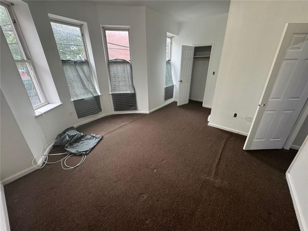 2120 Vyse Avenue, Unit 2 Bronx, NY 10460 - Photo 3 of 7 a house with furniture and a window