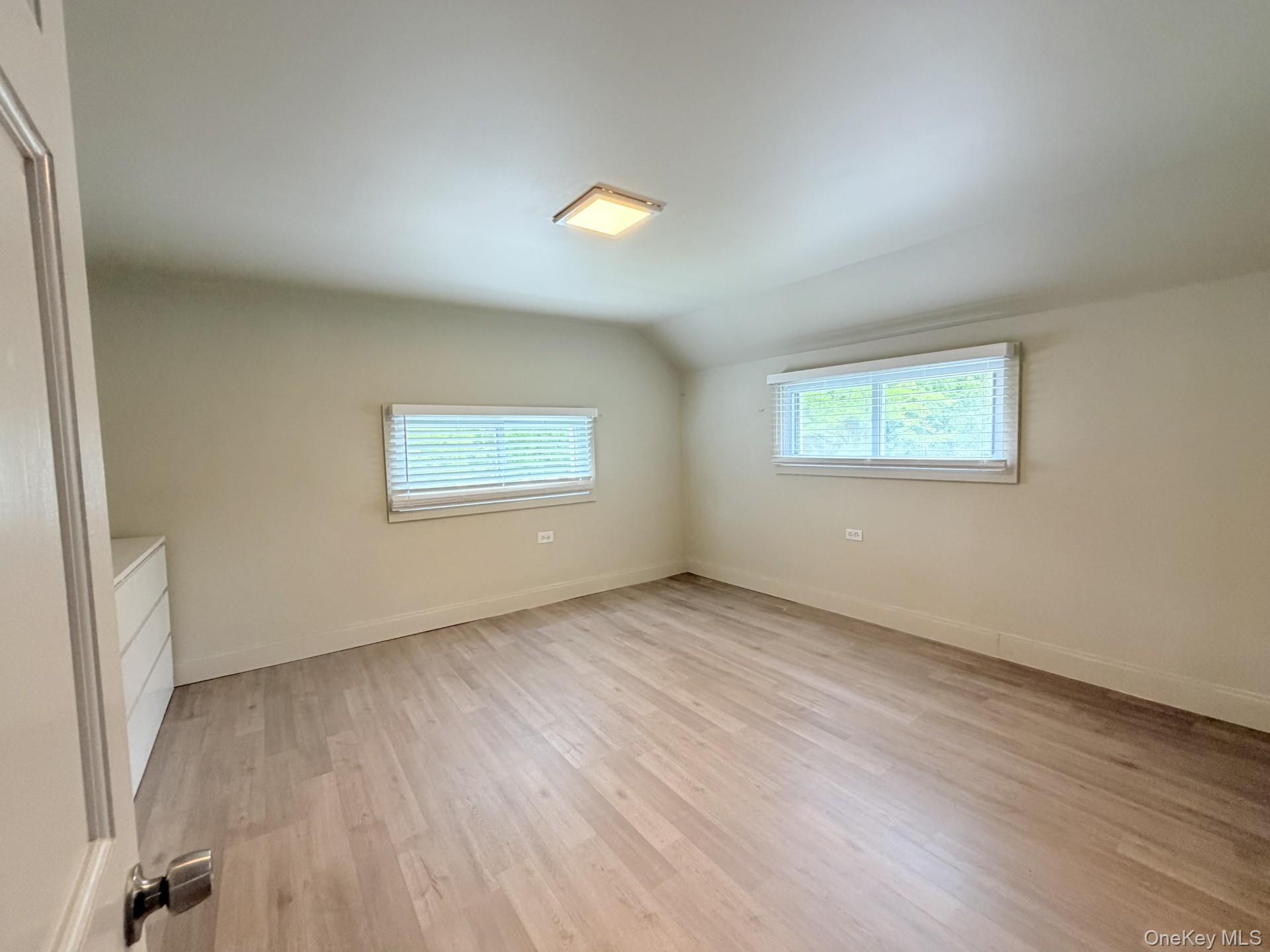 4 Lower Trinity Pass Road Pound Ridge, NY 10576 - Photo 26 of 29 an empty room with a window