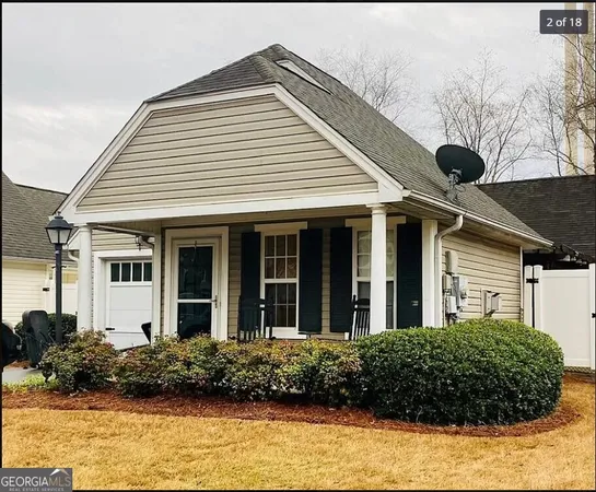 a view of a house with a garden