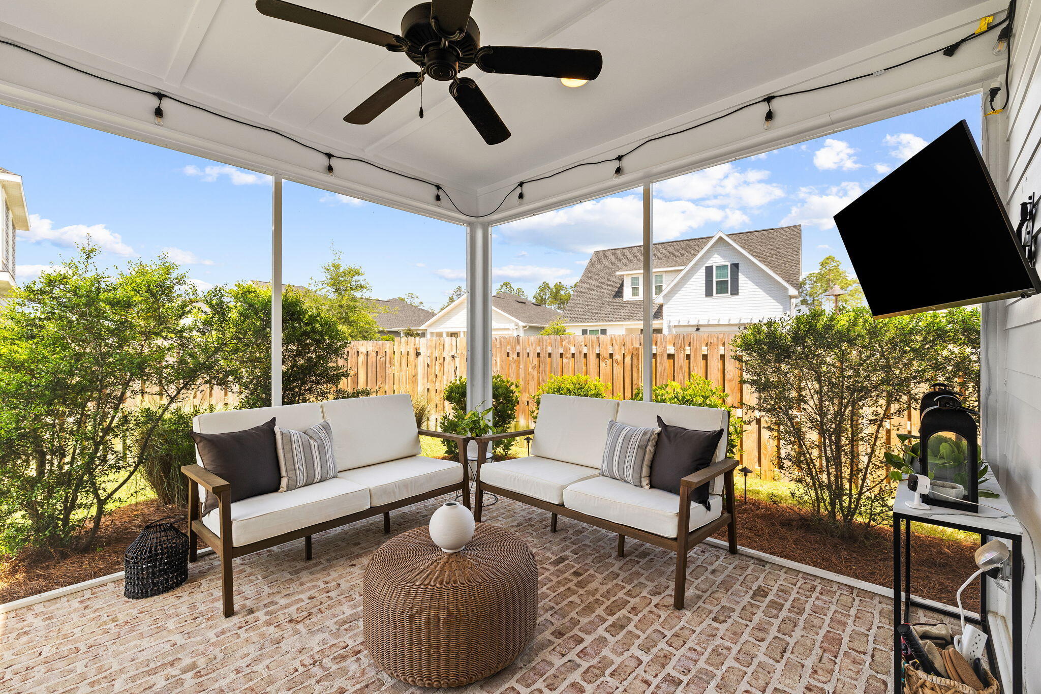 12 Roundwood Dr Inlet Beach Inlet Beach, FL 32461 - Photo 14 of 57 a outdoor living space with furniture and a flat screen tv