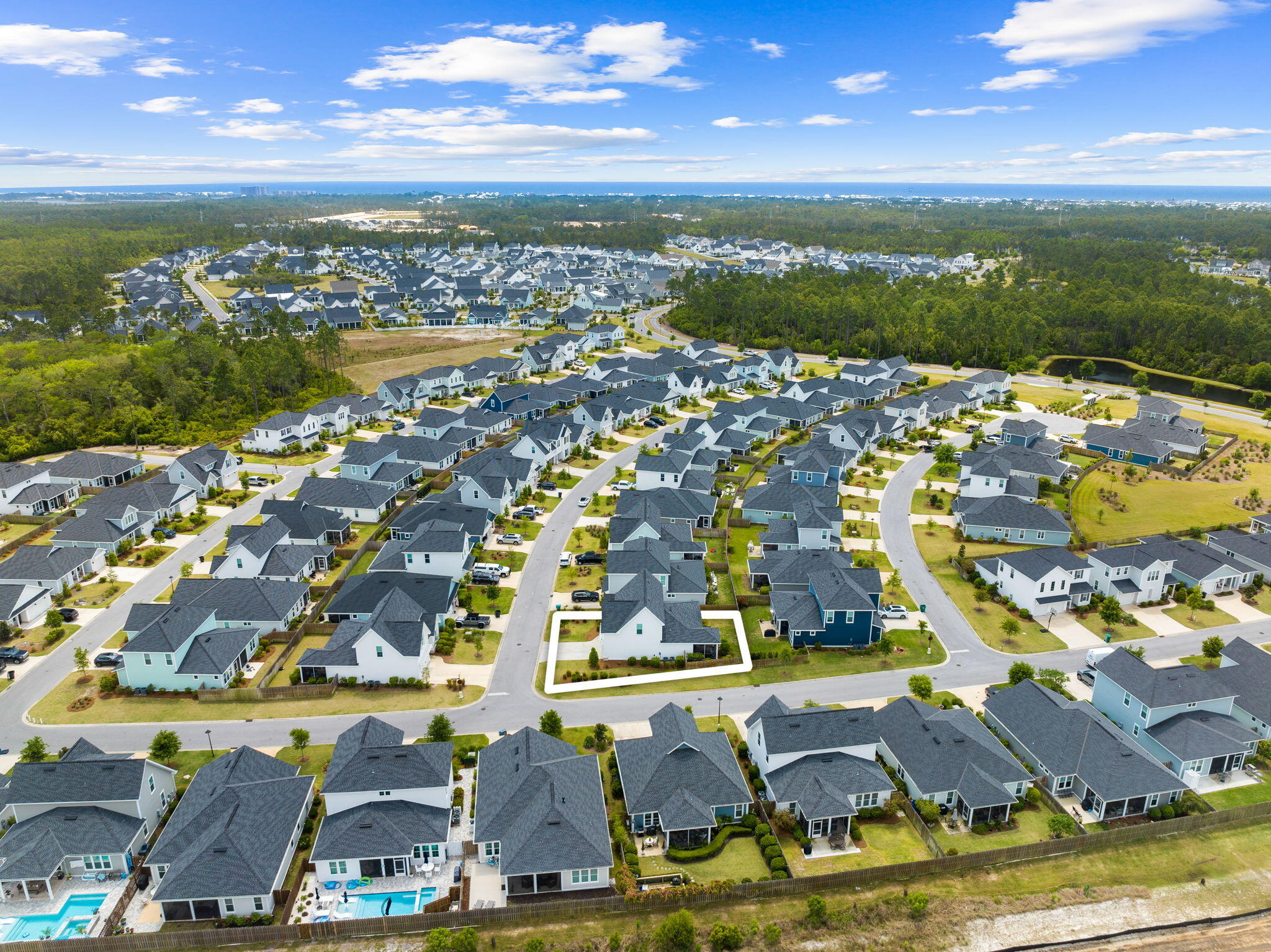 12 Roundwood Dr Inlet Beach Inlet Beach, FL 32461 - Photo 2 of 57 an aerial view of residential houses with outdoor space