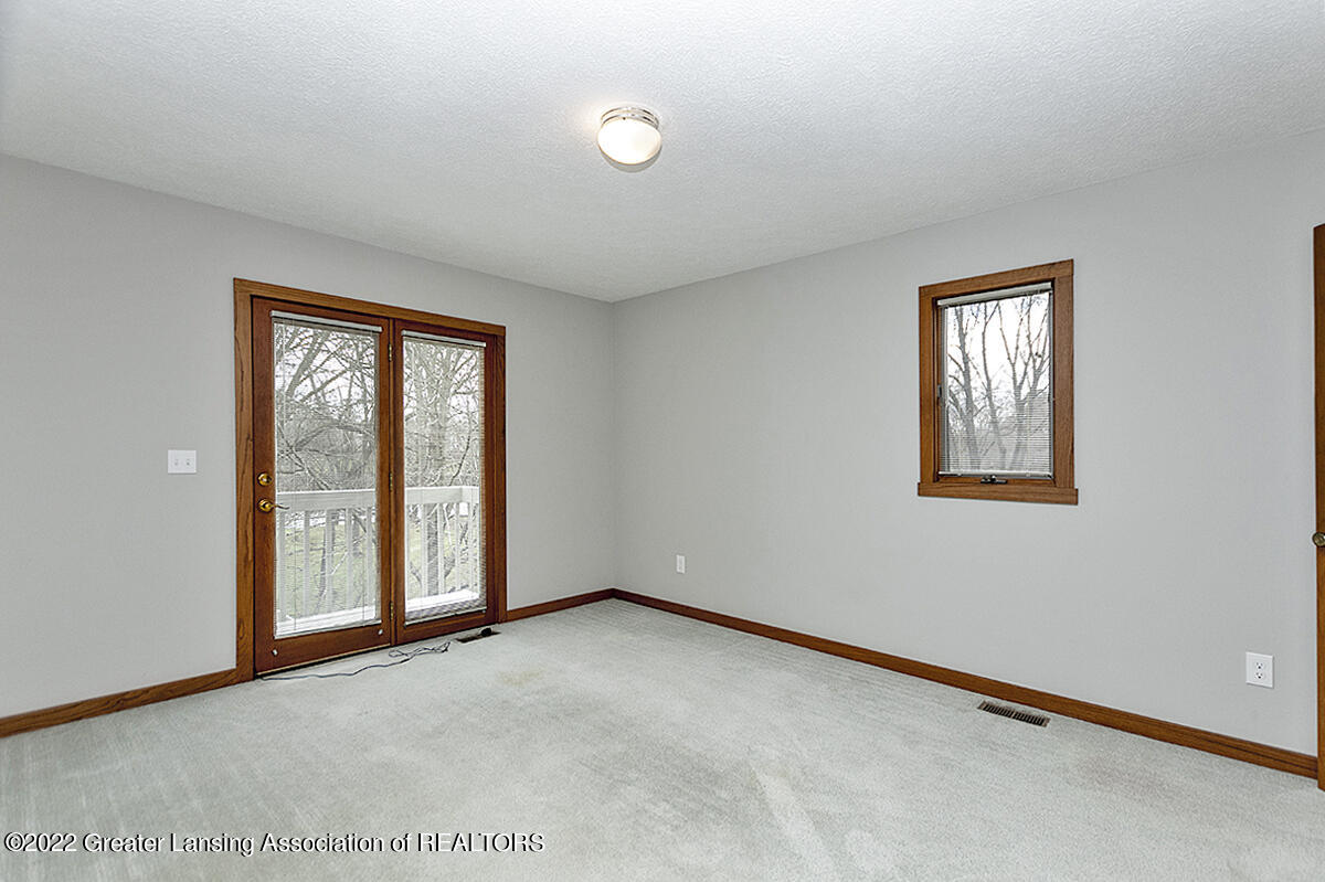 3233 Tecumseh River Road Lansing, MI 48906 - Photo 26 of 37 Bedroom 3
